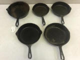 Lot of 5 Cast Iron Skillets, unmarked 7H, and more