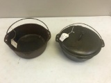 2- Cast Iron Dutch Ovens, one without lid