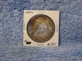 1884O MORGAN DOLLAR (OBV. TONING) BU