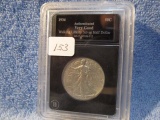 1934 WALKING LIBERTY HALF IN HOLDER VG