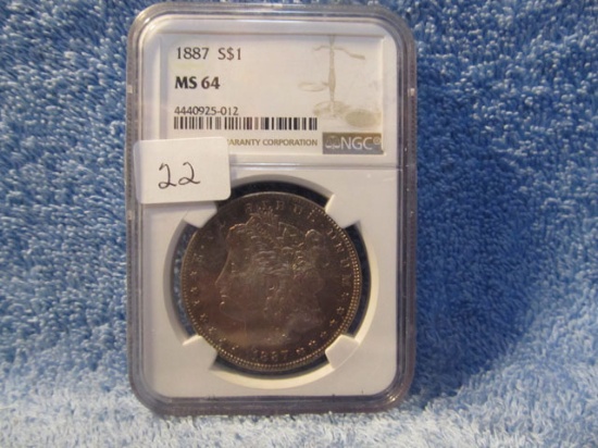 1887 MORGAN DOLLAR NGC MS64 (NICE TONING)