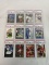 (12) PSA Graded Football Cards - Rice, Smith, Manning, Sanders, Lewis & Others