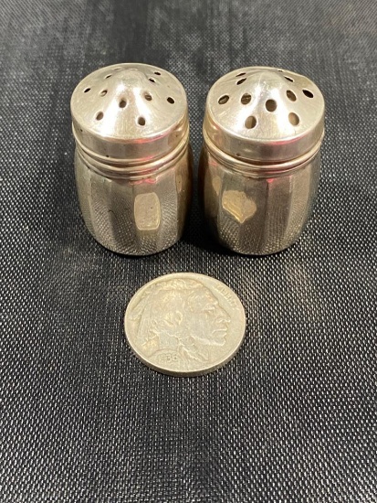 STERLING marked salt and pepper shaker, buffalo nickel included for size reference