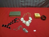 Large lot of assorted costume jewelry, and boxes