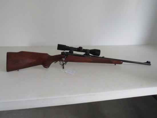 1958 Winchester Model 70 Featherweight 243 with 98% Bushnal