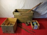 Wooden crate with assorted hand tools