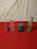 Coke bottle, medicine bottle, blue jar, and milk bottle