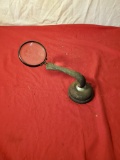 Heavy cast iron base with magnifying glass