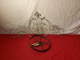 Metal wall embellishment, 35 x 16 inches, and vintage 8 inch metal wheel