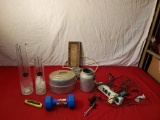 10 lb weight, candle holders, power strip, cords, and vintage metal containers