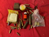 Various supplies and empty brass