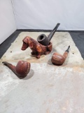 Dog shaped pipe holder and 3 pipes, Leather covered bowl no markings, Imported Briar, and Wally