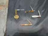 4 Small pen knives, dad Avon pen knife, bowling pin colonial, and others
