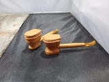 2 pipes, carved to resemble toilets, no markings