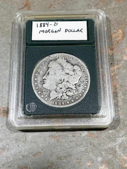 1884-O Morgan Silver Dollar in snap case