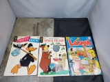 12 Cent Laugh, 12 cent Yogi Bear, and 15 cent Daffy Duck Vintage comic books
