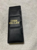 Coin Wallet with assorted foreign coinage