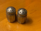 Pair of Sterling Salt and Pepper shakers, approx 1 inch tall