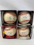 4 signed MLB baseballs: Dave Justice, Baerga, Tony Pena, Jaret Wright