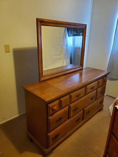 7 drawer dresser 60in x 32in mirror is 31in x 41in, dovetailed drawers