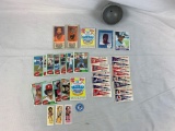 Baseball stickers, coca cola baseball cards, 1/2 of a baseball mold and more.