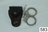 Smith & Wesson    Handcuffs    W/1 Key    In Leather Pouch    Condition: Good