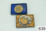 Lot:    Smith & Wesson    Belt Buckle   -  Smith & Wesson Handcuffs  W/1 Key    Condition: Excellent