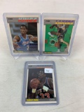 Three 1987-88 Fleer Basketball Cards - Patrick Ewing card #37 of 132; A.C. Green card #42 of 132 & O