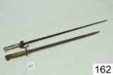 Lot of 2 Bayonets    1 - Wilkinson 1907    1 - Unknown    Condition: Fair