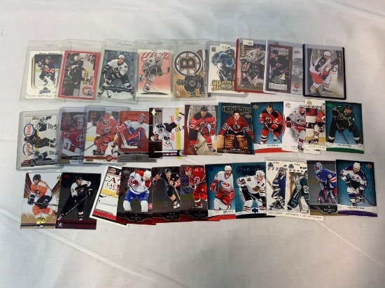 Lot of 32 Serial #'D Hockey cards, all #'D to 100 or less