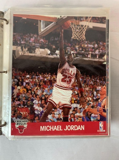 Large lot of oversize cards in binder, including 15 Michael Jordan's