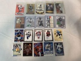 Lot of 20 Serial #'D Football star cards including Deion, LT, Rice, Romo, Vick, Ryan, Bettis, Etc.