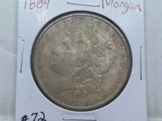 1884 MORGAN DOLLAR BU (TONED)