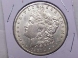 1887O MORGAN DOLLAR AU