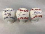 Yan Gomes, Ron Hassey, Roberto Perez signed baseballs in holders