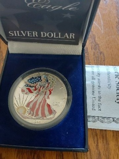 1999 COLORIZED SILVER EAGLE IN HOLDER
