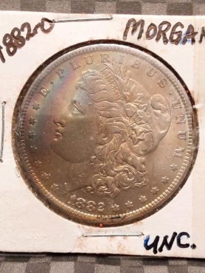 1882O MORGAN DOLLAR BU TONING