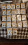 LOT OF 22 PROOF ROOSEVELT DIMES IN SGS SLABS