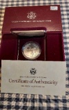 1988D OLYMPIC SILVER DOLLAR IN HOLDER BU