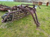 Pull Behind Hay Rake, currently has metal wheels, includes rubber wheels to change out