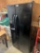 Frigidaire side by side black refrigerator, manufactured in 2015, 33.5 inches wide, 70 tall