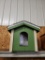 Unused Dog House, well built, 18 x18 square, 20 inches tall to peak, door is 9.5 inches tall