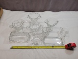 9- Stamped Heisey serving pieces, creamers, sugars, butter dish, one missing top