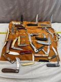 Knife roll, with several assorted foreign made knives, some functional, some need repair