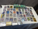 1990 Upper deck set in cello and 50 Ken Griffey Jr cards in top loaders