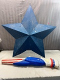 Large metal star and Uncle Sam Blowmold, feet have been cut off