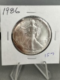 1986 US Silver Eagle .999 Fine Silver coin, UNC, some toning, KEY DATE