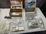Pair of AMT 1/25th scale model kits, 1965 Chevy El Camino and 1969 Cougar Eliminator