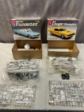 Pair of AMT 1/25th scale model kits, 1969 Cougar Eliminator and1966 Ford Thunderbird