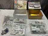 Pair of AMT 1/25th scale model kits, 1996 Chevrolet Corvette and 1969 Olds W-30 442